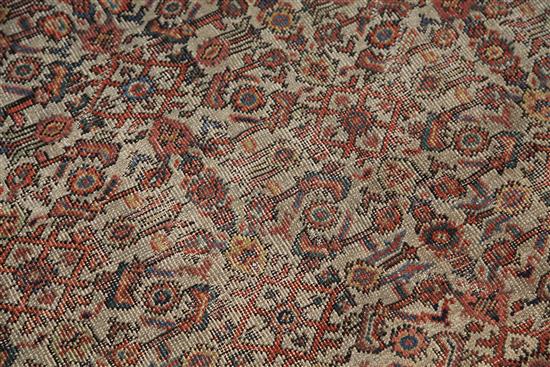 A large North West Persian cream ground carpet, 16ft 5in by 13ft 8in.